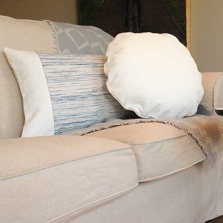 Decorative pillow in white leather